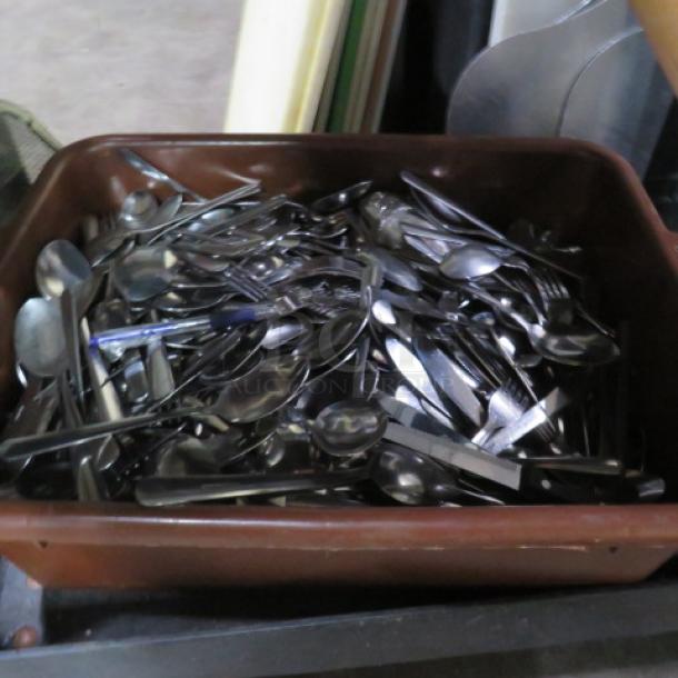 One Bussing Tub Full Of Flatware. - Image 1 of 1