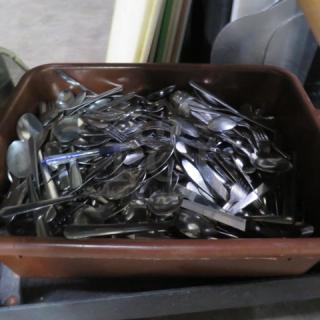 One Bussing Tub Full Of Flatware.