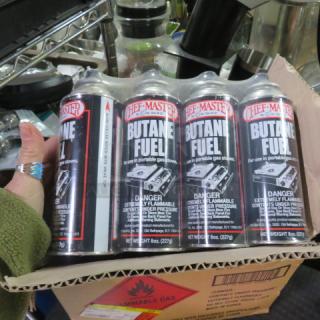 One Lot Of 12 NEW Cans Of Butane Fuel.