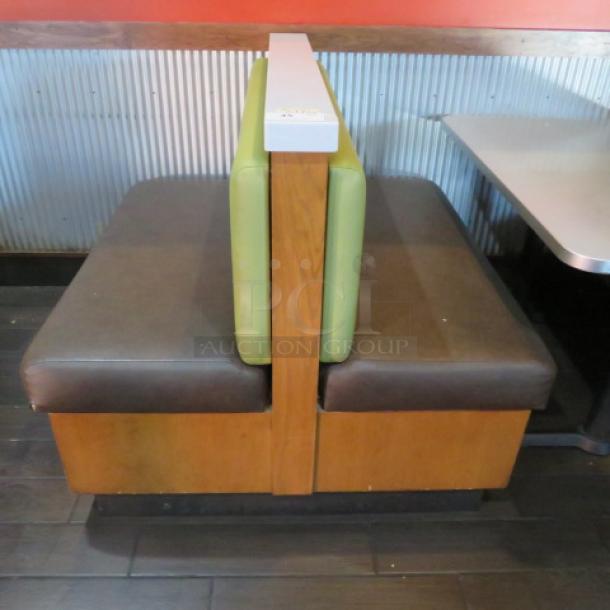 One Double Sided Wooden Boothe With A Green Cushioned Back And Brown Cushioned Seat, With A Marble Top. 48.5X48X41 - Image 1 of 3