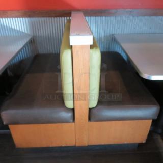 One Double Sided Wooden Boothe With A Green Cushioned Back And Brown Cushioned Seat, With A Marble Top. 48.5X48X41