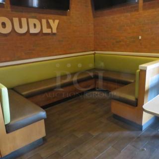 One Wooden Corner Booth  With A Green Cushioned Back And  A Brown Cushioned Seat. 157X27X41