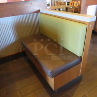 One Single Sided  Wooden Booth With A Green Cushioned Back And  A Brown Cushioned Seat, A Finished Back, And Marble Top. 48.5X27X41