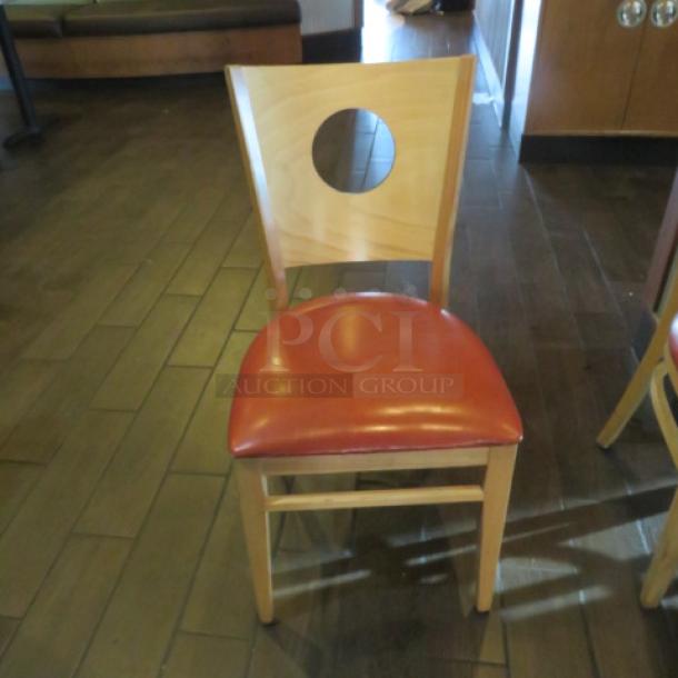 Wooden Chair With A Orange Cushioned Seat. 4XBID - Image 1 of 3