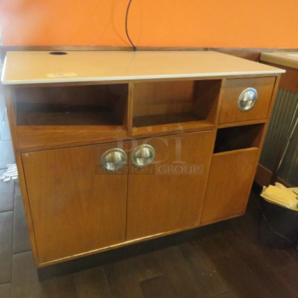 One Wooden Waitress Stand With A Marble Top And 1 Drawer And 2 Doors. 48X24X41 - Image 1 of 1