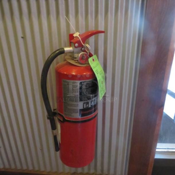 One Simplex Grinell ABC Fire Extinguisher. - Image 1 of 1