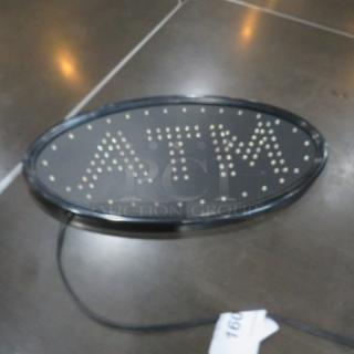 One 19X10 ATM Sign.
