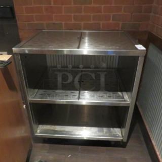 One Stainless Steel 3 Shelf Drain Table. 36.5X27X42