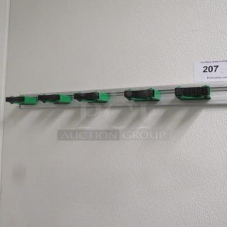 One Wall Mount Mop/Broom Holder.