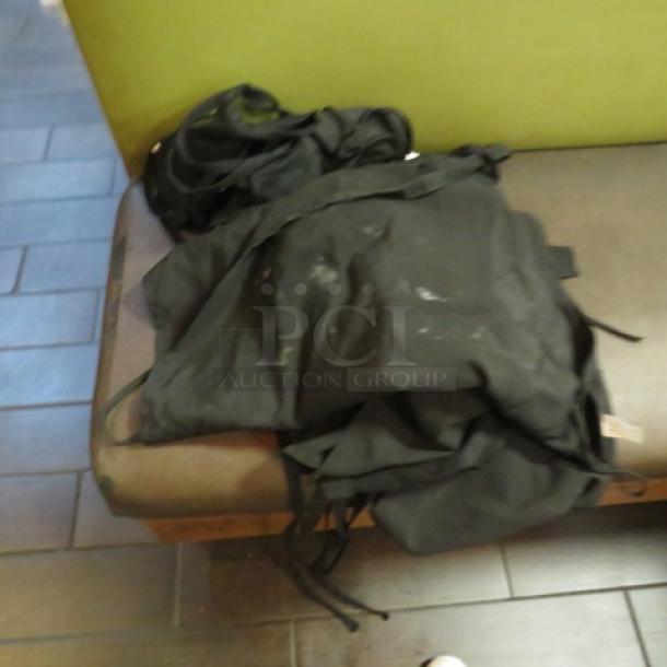 One Lot Of 8 Aprons. - Image 1 of 1