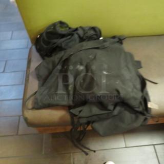 One Lot Of 8 Aprons.