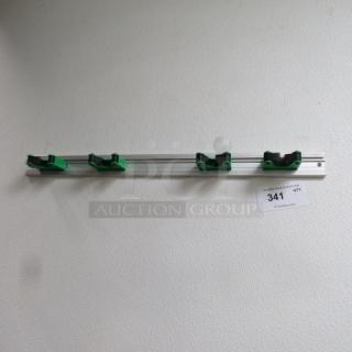 One Wall Mount Mop/Broom Holder.