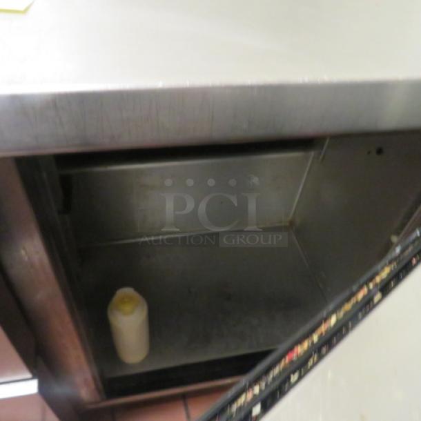 One True 2 Door Refrigerated Prep Table On Casters. Model# TSSU-36-12M-B.  115 Volt. 36.5X34X43.5. $4159.18 - Image 2 of 2