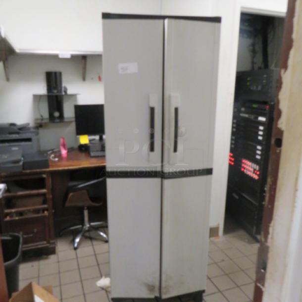 One 2 Door Poly Cabinet. 25.5X18.5X72 - Image 1 of 2