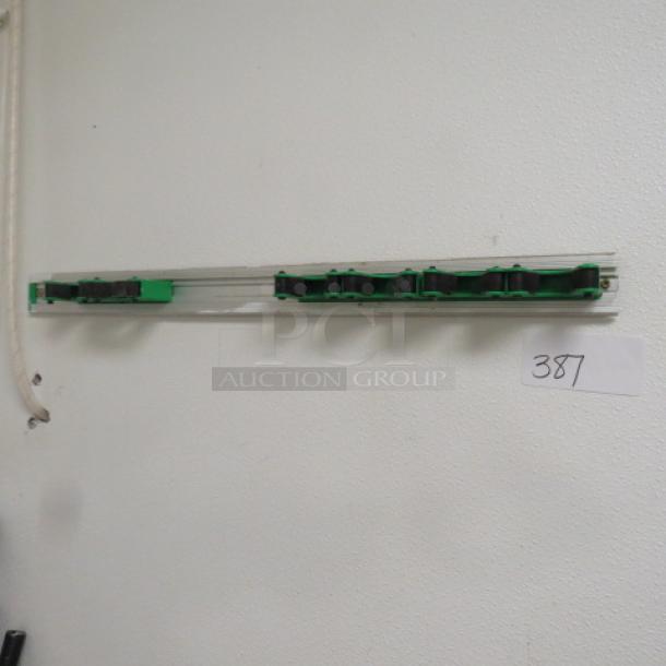 One Wall Mount Mop/Broom Holder. - Image 1 of 1