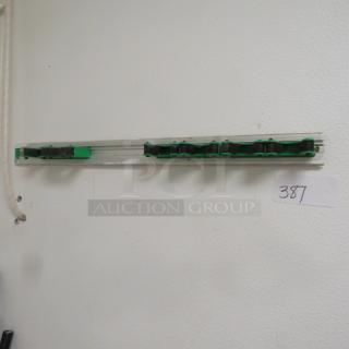 One Wall Mount Mop/Broom Holder.