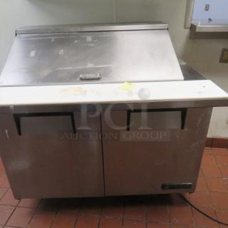 One True 2 Door Refrigerated Prep Table With Cutting board On Casters. 115 Volt. Model# TSSU-48-18M-B. 48X34X46.5. $4810.00