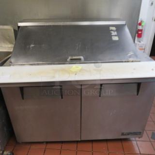 One True 2 Door Refrigerated Prep Table With Cutting board On Casters. 115 Volt. Model# TSSU-48-18M-B. 48X34X46.5. $4810.00