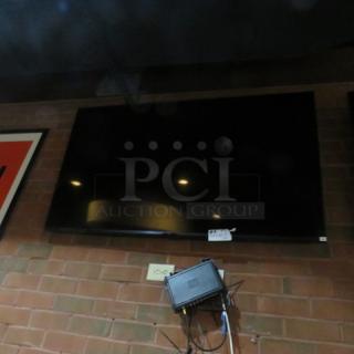 One 60 Inch LG Wall Mount TV.