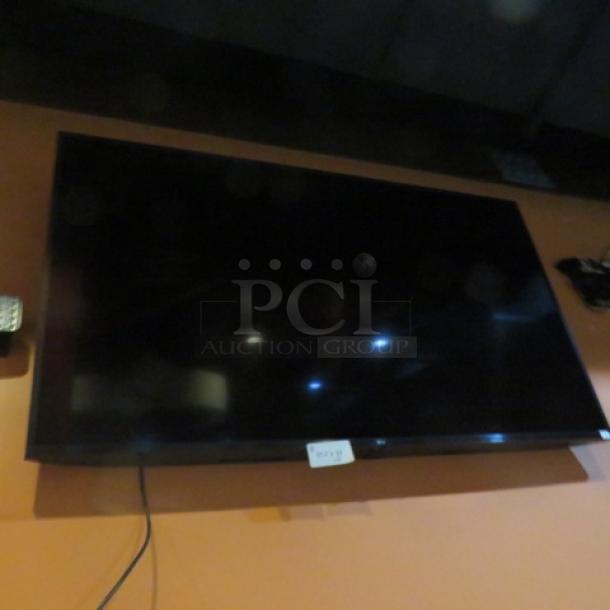 One 65 Inch LG Wall Mount TV. - Image 1 of 1