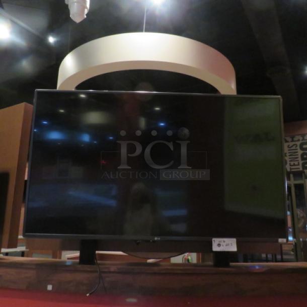 One 50 Inch LG Wall Mount TV. - Image 1 of 1