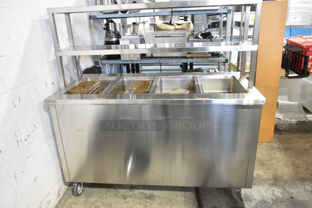 BRAND NEW SCRATCH AND DENT! 2022 Delfield SH-4 Stainless Steel Commercial Floor Style 4 Bay Steam Table on Commercial Casters. 120/208 Volts, 1 Phase. - Image 6 of 13