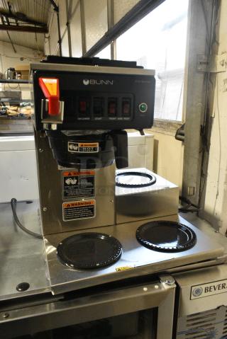 BRAND NEW SCRATCH AND DENT! 2024 Bunn CWTF15 Stainless Steel Commercial Countertop 12 Cup Automatic Coffee Brewer with 3 Lower Warmers and Hot Water Faucet and Poly Brew Basket. 120 Volts, 1 Phase.