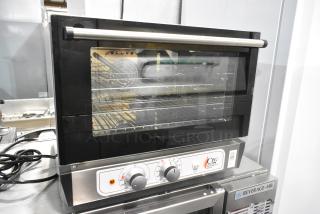 BRAND NEW SCRATCH AND DENT! Cooking Performance Group CPG COH-T3-A Electric Thermostatic Countertop 3 Tray Half Size Convection Oven with Moisture Injection. 110 Volts, 1 Phase. Tested and Powers On But Does Not Get Warm