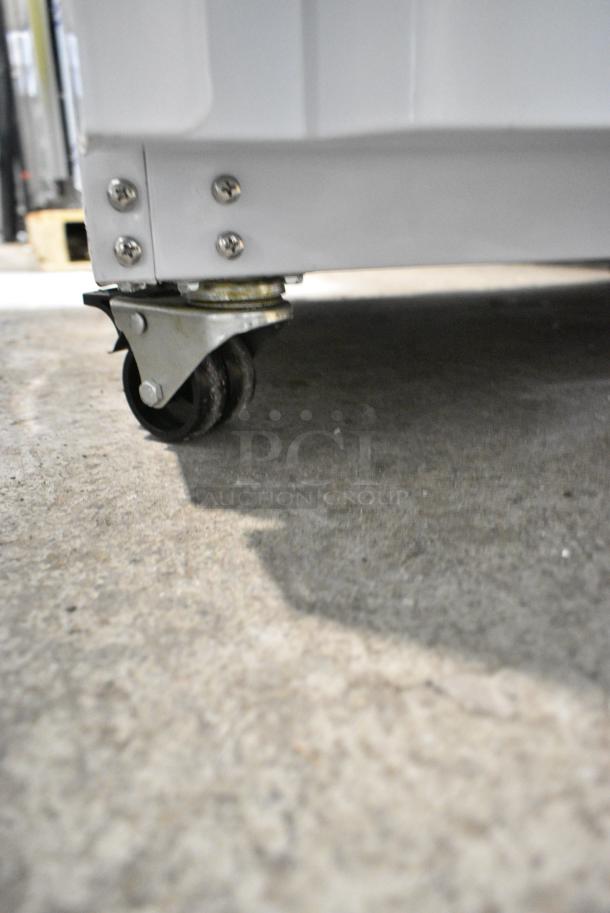BRAND NEW SCRATCH AND DENT! Galaxy 177GRI18FW Metal Commercial Single Door Reach In Freezer on Commercial Casters. 115 Volts, 1 Phase. Tested and Working! - Image 3 of 6