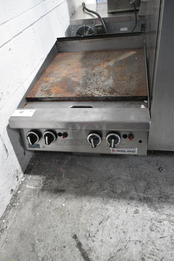 Garland Stainless Steel Commercial Countertop Natural Gas Powered Flat Top Griddle. - Image 1 of 5