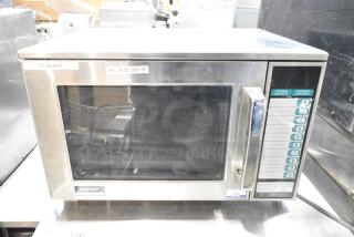 2021 Sharp R-25JT-F Stainless Steel Commercial Countertop Microwave Oven. 120 Volts, 1 Phase.