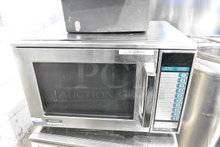 2021 Sharp R-25JT-F Stainless Steel Commercial Countertop Microwave Oven 120 Volts, 1 Phase.
