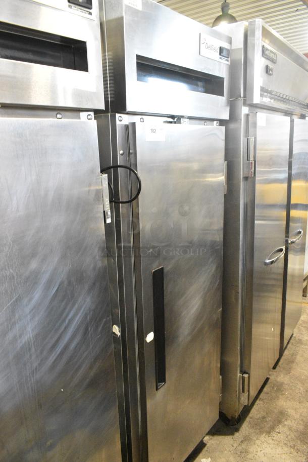 Delfield 6125XL-S Stainless Steel Commercial Single Door Reach In Freezer w/ Racks on Commercial Casters. 115 Volts, 1 Phase. Tested and Working! - Image 1 of 6