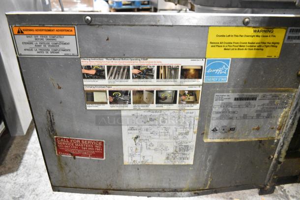 Pitco Frialator SSH60W Stainless Steel Commercial Floor Style Natural Gas Powered 4 Bay Deep Fat Fryer w/ 6 Metal Fry Baskets on Commercial Casters. 100,000 BTU. - Image 4 of 9