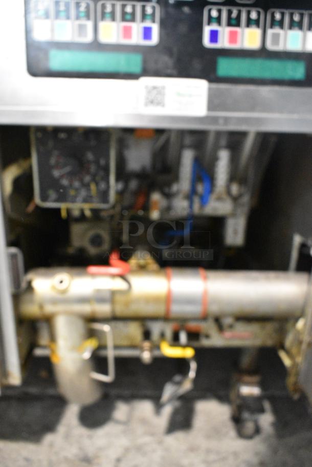 Pitco Frialator SSH60W Stainless Steel Commercial Floor Style Natural Gas Powered 4 Bay Deep Fat Fryer w/ 6 Metal Fry Baskets on Commercial Casters. 100,000 BTU. - Image 7 of 9