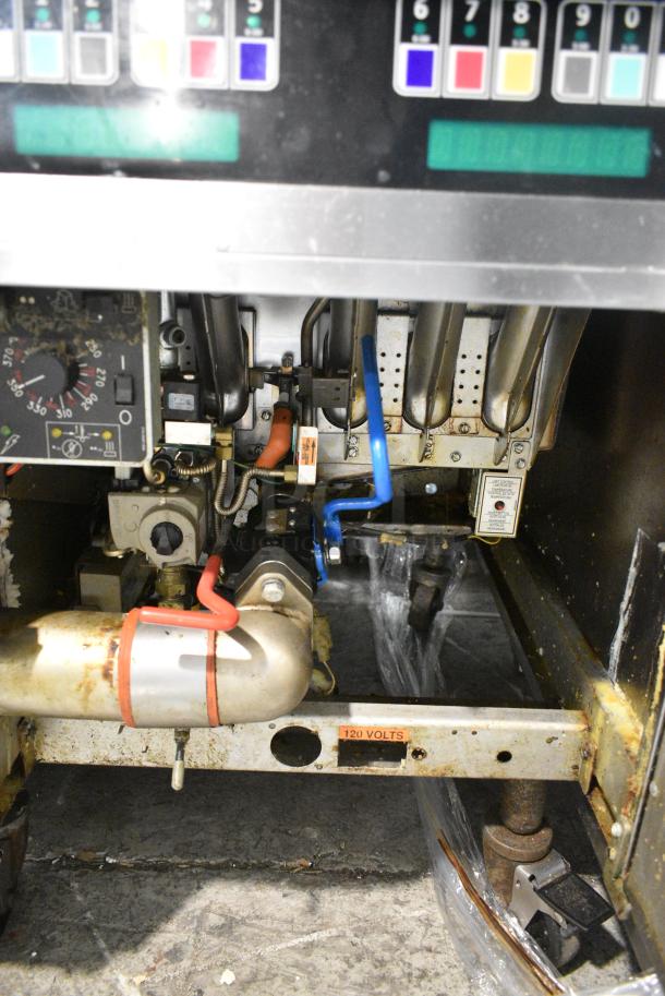 Pitco Frialator SSH60W Stainless Steel Commercial Floor Style Natural Gas Powered 4 Bay Deep Fat Fryer w/ 6 Metal Fry Baskets on Commercial Casters. 100,000 BTU. - Image 9 of 9