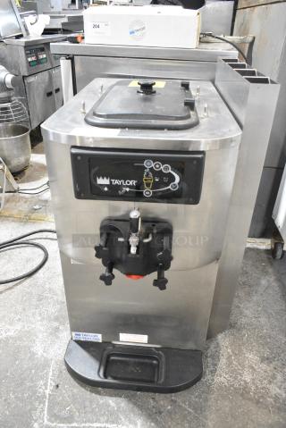 Taylor C709-33 Stainless Steel Commercial Countertop Air Cooled Single Flavor Soft Serve Ice Cream Machine. 208-230 Votls, 3 Phase.