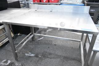Stainless Steel Table w/ Back Splash.