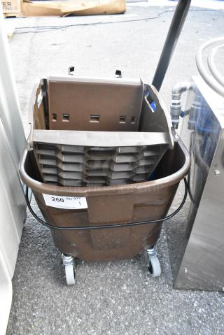 Brown Poly Mop Bucket w/ Wringing Attachment on Commercial Casters.