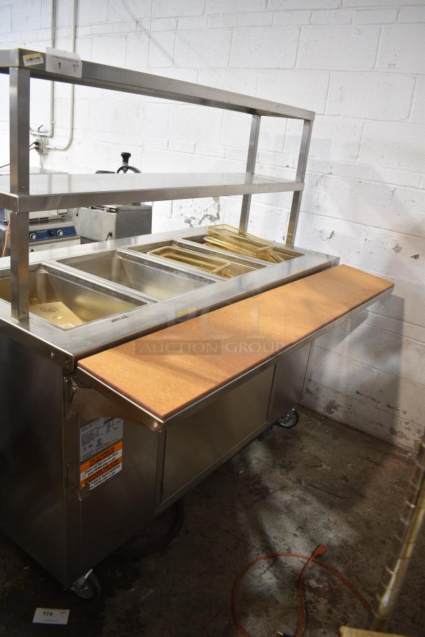 BRAND NEW SCRATCH AND DENT! 2022 Delfield SH-4 Stainless Steel Commercial Floor Style 4 Bay Steam Table on Commercial Casters. 120/208 Volts, 1 Phase. - Image 12 of 13