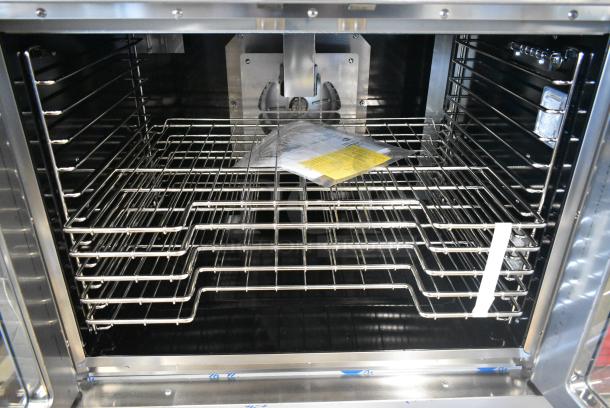 BRAND NEW SCRATCH AND DENT! Vulcan VC4GD-11D150K Stainless Steel Commercial Natural Gas Powered Full Size Convection Oven w/ View Through Doors, Metal Oven Racks and Thermostatic Controls. Tested and Working! - Image 4 of 5