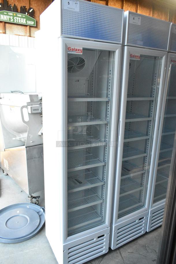 BRAND NEW SCRATCH AND DENT! Galaxy 177GDN5RBW Metal Commercial Single Door Reach In Cooler Merchandiser with Red, White, and Blue LED Lighting. 110-120 Volts, 1 Phase. Tested and Working! - Image 1 of 5