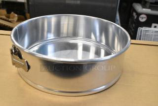 11 BRAND NEW SCRATCH AND DENT! Choice 407SFPANA10 10" x 3" Natural Finish Aluminum Springform Cake Pan. 11 Times Your Bid!