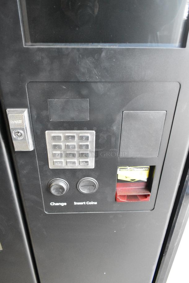 BRAND NEW SCRATCH AND DENT! KoolMore KM-VMNT-50-B Non-Refrigerated Snack Vending Machine with 60 Slots and 22 Inch Touch Screen in Black. 110 Volts, 1 Phase. Tested and Working! - Image 4 of 7