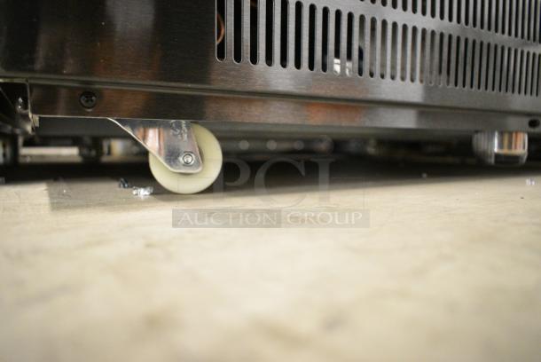 BRAND NEW SCRATCH AND DENT! 2024 Avantco 224BCAC36 36" Black Curved Dual Service Refrigerated Air Curtain Merchandiser on Commercial Casters. 115 Volts, 1 Phase. Tested and Working! - Image 3 of 10