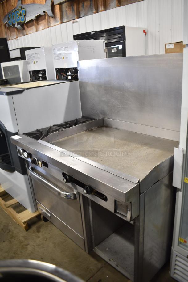 Southbend S48AC-3TR Stainless Steel Commercial Propane Gas Powered Flat Top Griddle w/ 2 Burner Range, Oven and Back Splash on Commercial Casters. - Image 1 of 10
