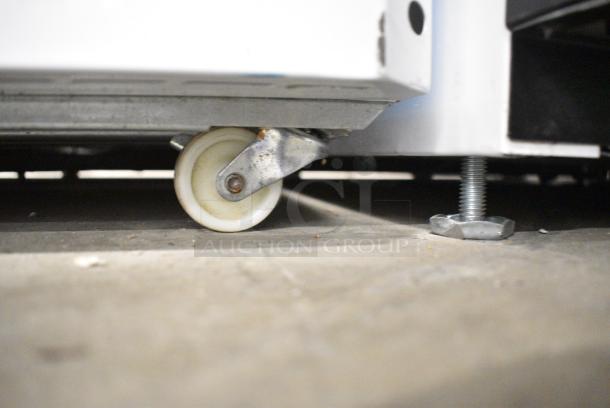 CS-250 Metal Commercial Single Door Reach In Cooler Merchandiser w/ Poly Coated Racks on Commercial Casters. 115 Volts, 1 Phase. Tested and Working! - Image 3 of 5