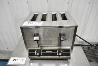 Toastmaster TP120 Stainless Steel Commercial Countertop 4 Slot Toaster. 208 Volts, 1 Phase.