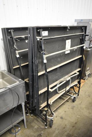 2 Folding Stage Pieces on Casters. 2 Times Your Bid!