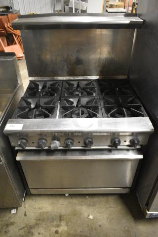 Tristar TSR-6-E Stainless Steel Commercial Natural Gas Powered 6 Burner Range w/ Oven, Over Shelf and Back Splash.